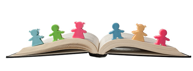 Image showing Figurines on open book