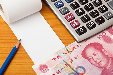 Image showing Blank list with Renminbi and calculator