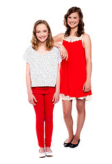 Image showing Two young girls posing. Full length shot