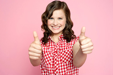 Image showing Gorgeous girl showing double thumbs up