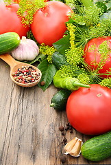 Image showing Vegetables for pickling on a wooden table.