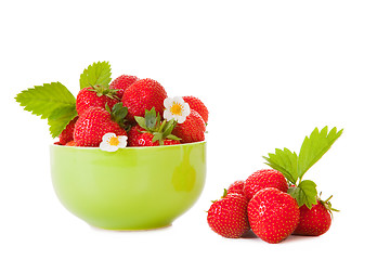 Image showing green bowl with fresh strawberry on the isolated white