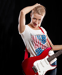 Image showing Woman Playing the Guitar