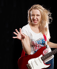 Image showing Woman Playing the Guitar