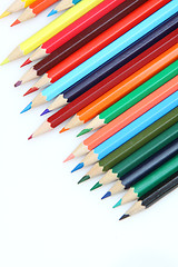 Image showing Color pencils arrange on white background