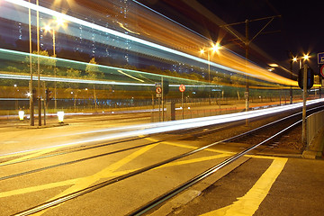 Image showing Light rail at night in Hong Kong, it is a kind of transportation