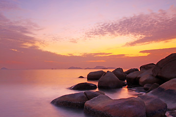 Image showing Sunset over the ocean. Nature composition under long exposure.