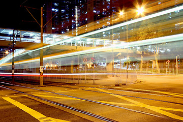 Image showing Light rail at night in Hong Kong, it is a kind of transportation