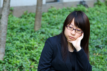 Image showing Businesswoman thinking outdoor