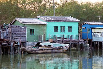 Image showing Wooden houses along the river