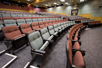 Image showing Lecture hall with colorful chairs in a university