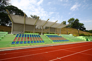 Image showing Stadium chairs and running track