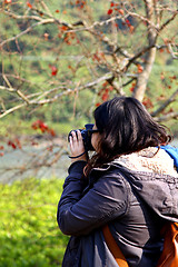 Image showing Female photographer