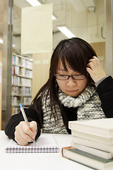 Image showing Asian university student in library