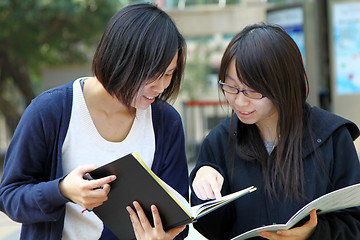 Image showing Asian students studying and discussing in university