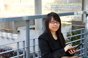 Image showing Businesswoman analyzing