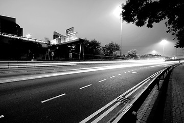 Image showing Traffic in modern city in black and white tone