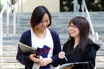 Image showing Asian students studying and discussing in university
