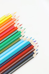 Image showing Color pencils arrange on white background