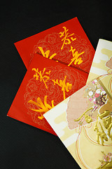Image showing Red packets on black background