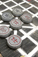 Image showing Chinese chess on ground