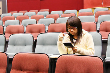 Image showing Asian student studying in lecture 