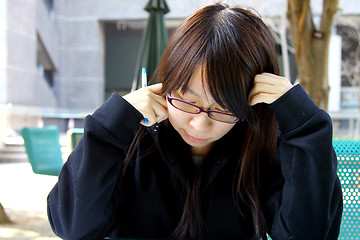 Image showing Asian girl studying in university