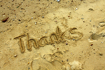 Image showing Thanks words on sand