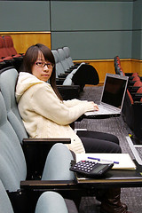 Image showing Asian university student using laptop and studying