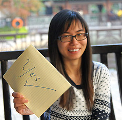 Image showing Asian woman with YES sign