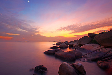 Image showing Sunset over the ocean. Nature composition under long exposure.