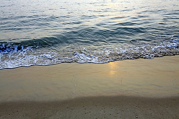 Image showing Wave under sunset for background