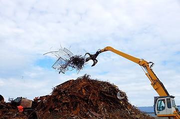 Image showing Unloading of scrap metal