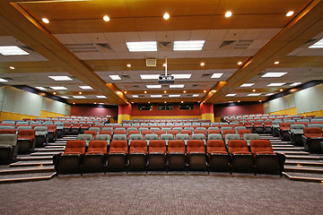 Image showing Colorful chairs in lecture hall of a university