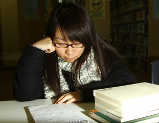 Image showing Asian girl studying in university