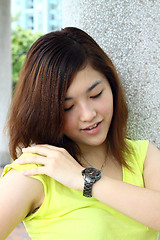 Image showing Asian woman smiling outdoor