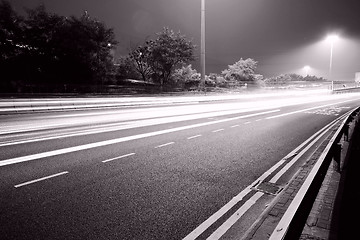 Image showing Traffic in modern city in black and white tone