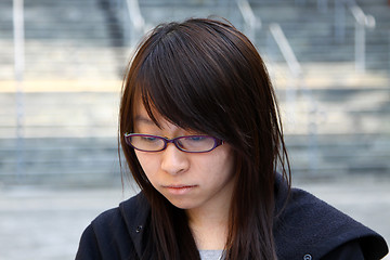 Image showing Asian sad woman