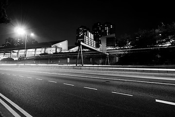 Image showing Traffic in modern city in black and white tone