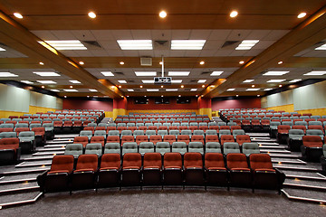 Image showing Lecture hall with colorful chairs in a university