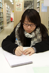 Image showing Asian university student in library