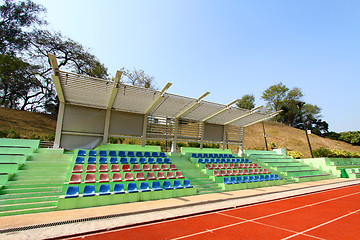 Image showing Stadium seats and running track