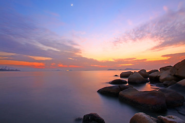 Image showing Sunset over the ocean. Nature composition under long exposure.