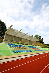 Image showing Stadium chairs and running track