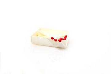 Image showing Red matches isolated on white background