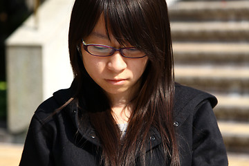 Image showing Asian sad girl