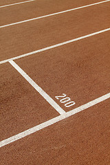 Image showing Running track in a stadium with number 200