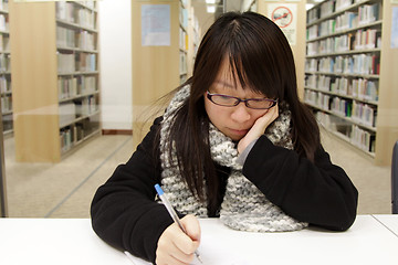 Image showing Asian girl studying in university