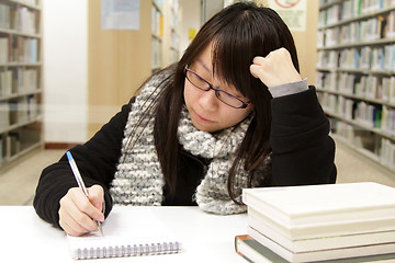 Image showing Asian girl studying in university