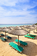 Image showing Beach umbrellas on sandy shore